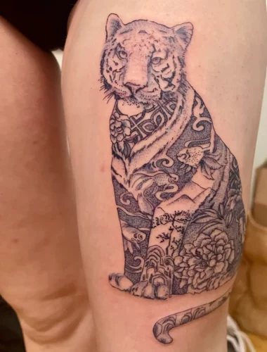 Photo d'un tatouage de tigre bleu