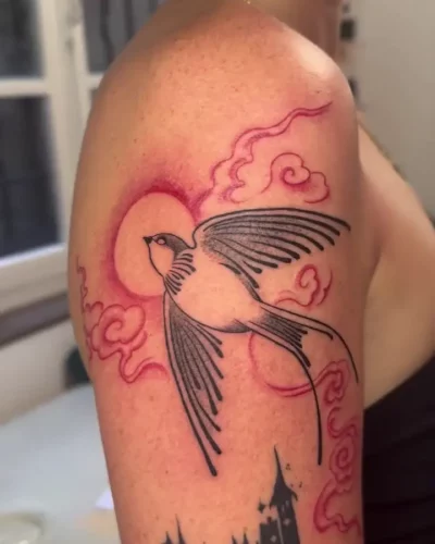 Photo d'un tatouage d'une rose sur un bras